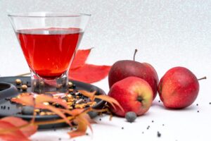 Illustration of apple juice, often drunk as a source of vitamins and minerals.